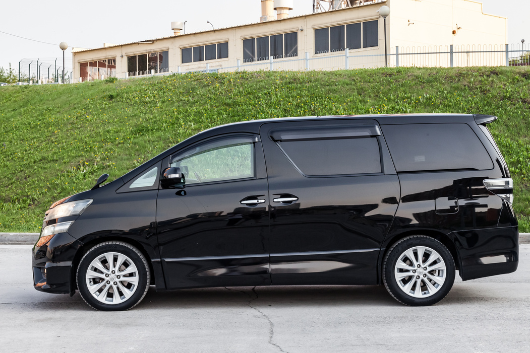 Side View of Toyota Vellfire Japanese Luxury Minivan Car in Blac